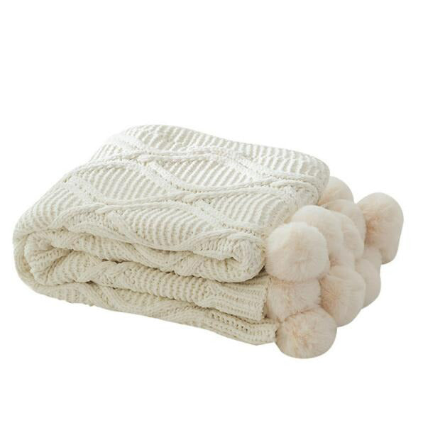 Beige cocooning throw
