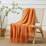 Petit plaid pour fauteuil orange